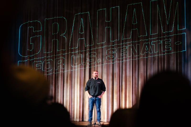 OGUNQUIT, MAINE - OCTOBER 22: U.S. senatorial candidate from Maine Graham Platner speaks at a town hall at the Leavitt Theater on October 22, 2025 in Ogunquit, Maine. Platner, a veteran of the U.S. Marines and an oyster farmer, is running for the seat held by Sen. Susan Collins (R-ME).