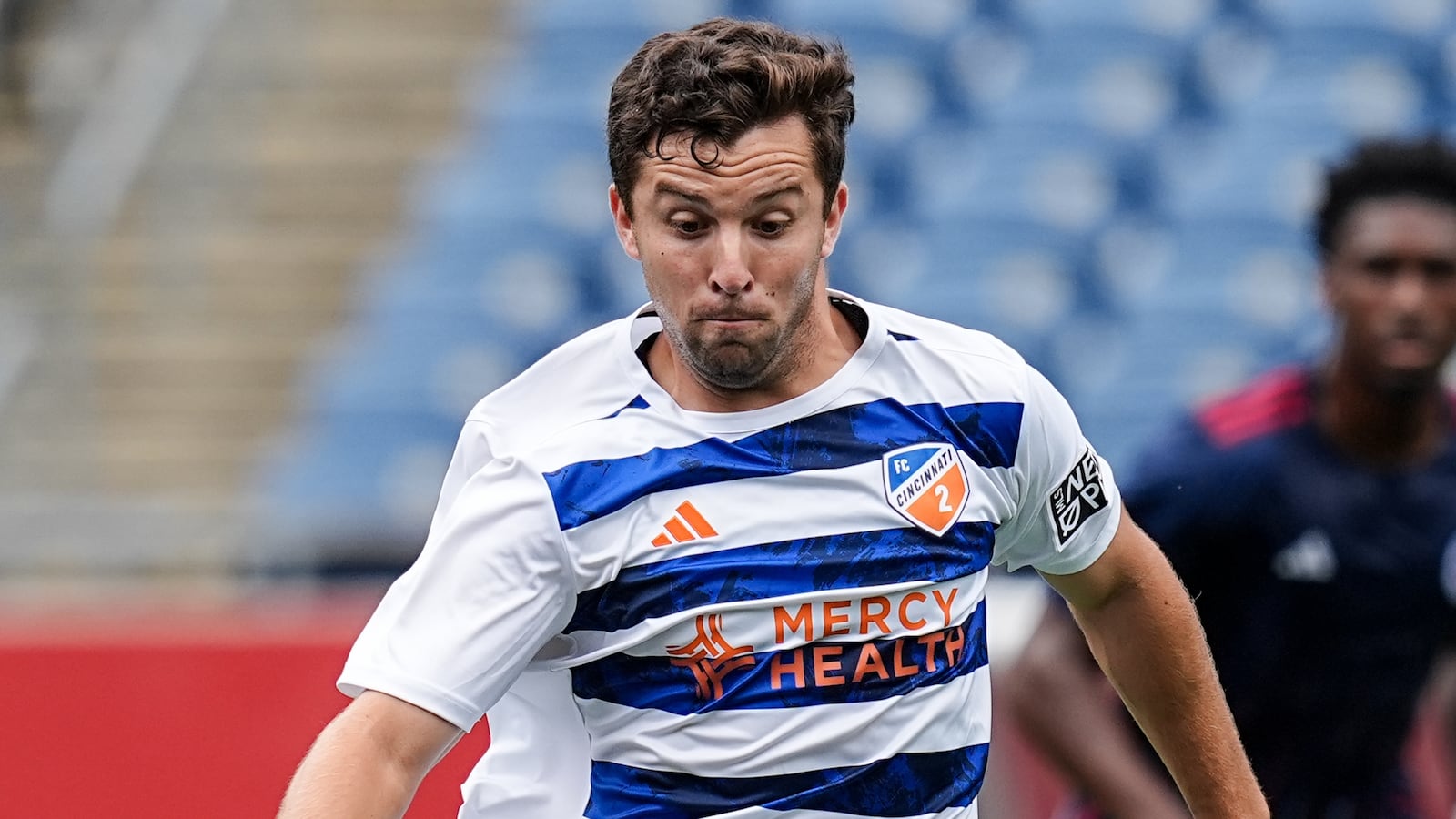 Peter Mangione #49 of FC Cincinnati 2 collects a pass during a game between FC Cincinnati II and New England Revolution II at Gillette Stadium on August 7, 2024 in Foxborough, Massachusetts.