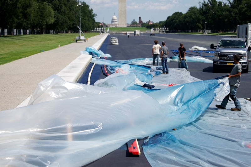 Workers continue repairs on the Lincoln Memorial Reflecting Pool in Washington, DC, on August 26, 2026.