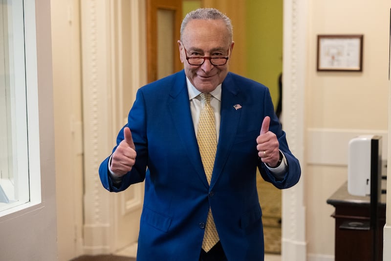 WASHINGTON DC, UNITED STATES - FEBRUARY 13: Senate Majority Leader Chuck Schumer (D-NY) gives photographers a thumbs up as he heads into a press conference following the successful package of the Foreign Aid bill in the Senate in Washington DC, United States on February 13, 2024. (Photo by Nathan Posner/Anadolu via Getty Images)