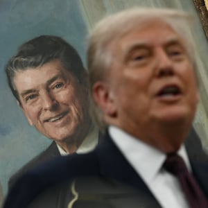 Donald Trump speaks in front of a portrait of former president Ronald Reagan in the Oval Office of the White House in Washington, DC, on August 6, 2025.
