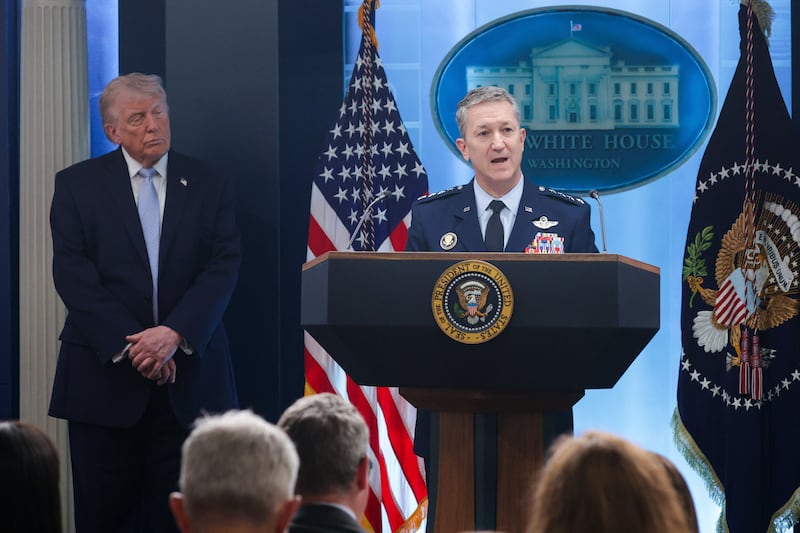 President Donald Trump, 79, standing with his eyes closed as Chairman of the Joint Chiefs of Staff General Dan Caine speaks at a news conference at the White House on April 06, 2026 in Washington, DC.