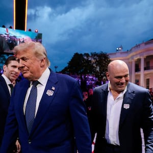 U.S. President Donald Trump arrives with UFC CEO Dana White for UFC Freedom 250 on the South Lawn of the White House in Washington, D.C., U.S., June 14, 2026. REUTERS/ Evan Vucci