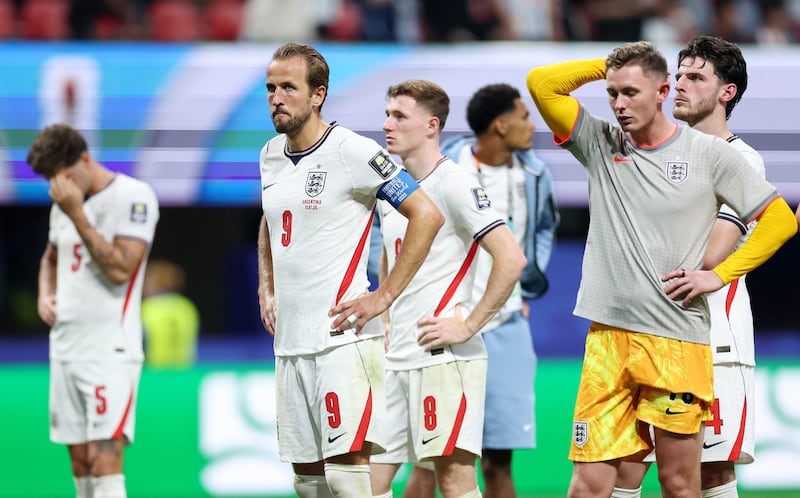 Harry Kane looks dejected after England's loss to Argentina in the World Cup semifinal.