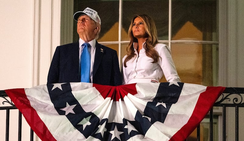 WASHINGTON, DC - JULY 04: President Donald Trump and First Lady Melania Trump watch fireworks during a Fourth of July celebration at the White House on July 4, 2025 in Washington, DC. The Independence Day celebrations come a day after the House of Representatives passed President Donald Trump's "Big, Beautiful Bill," which he signed earlier in the day. (Photo by Eric Lee/Getty Images)