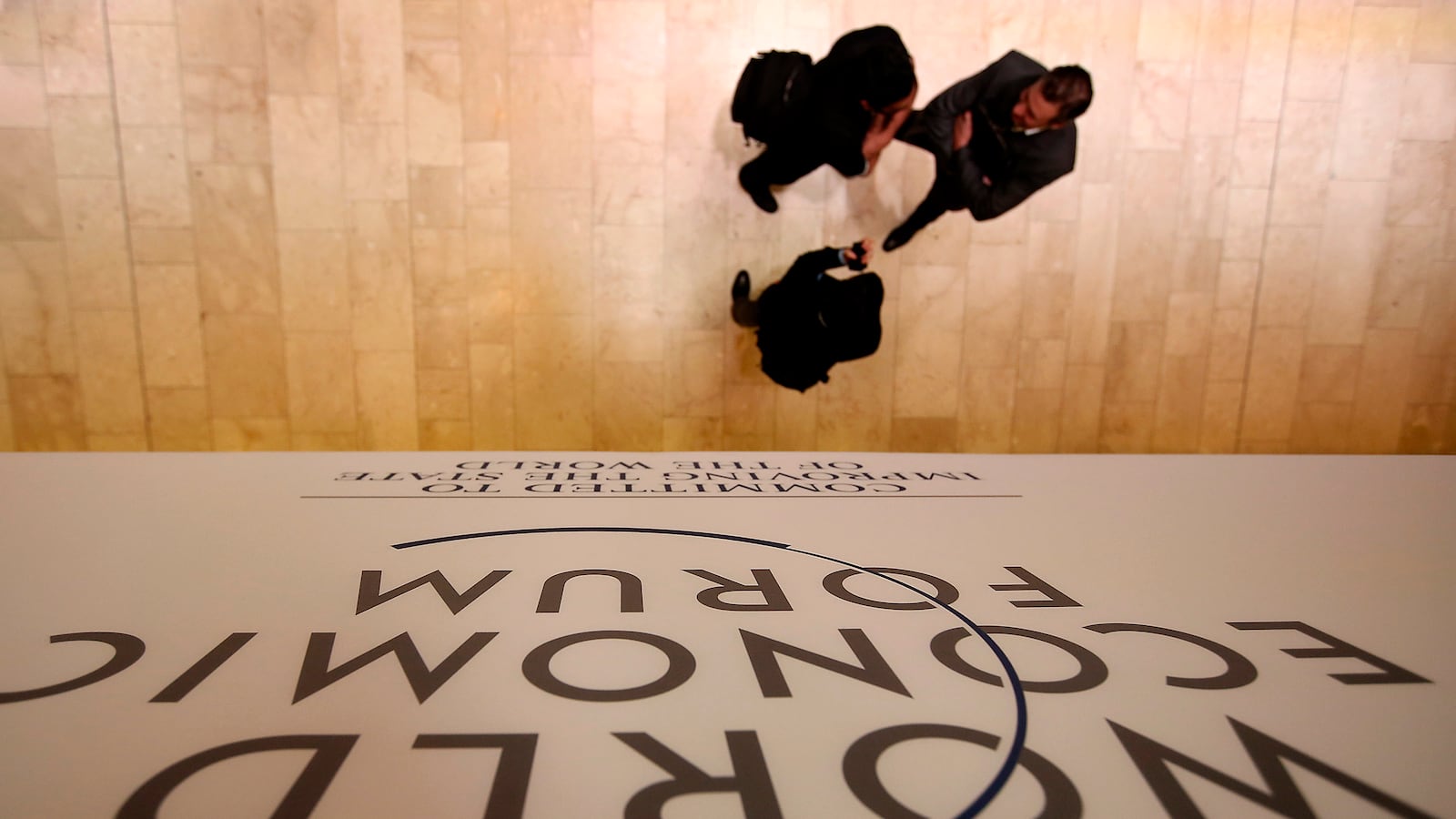 articles/2013/06/24/israelis-and-palestinians-getting-down-to-business/130126-davos-cheat_y5kfrj