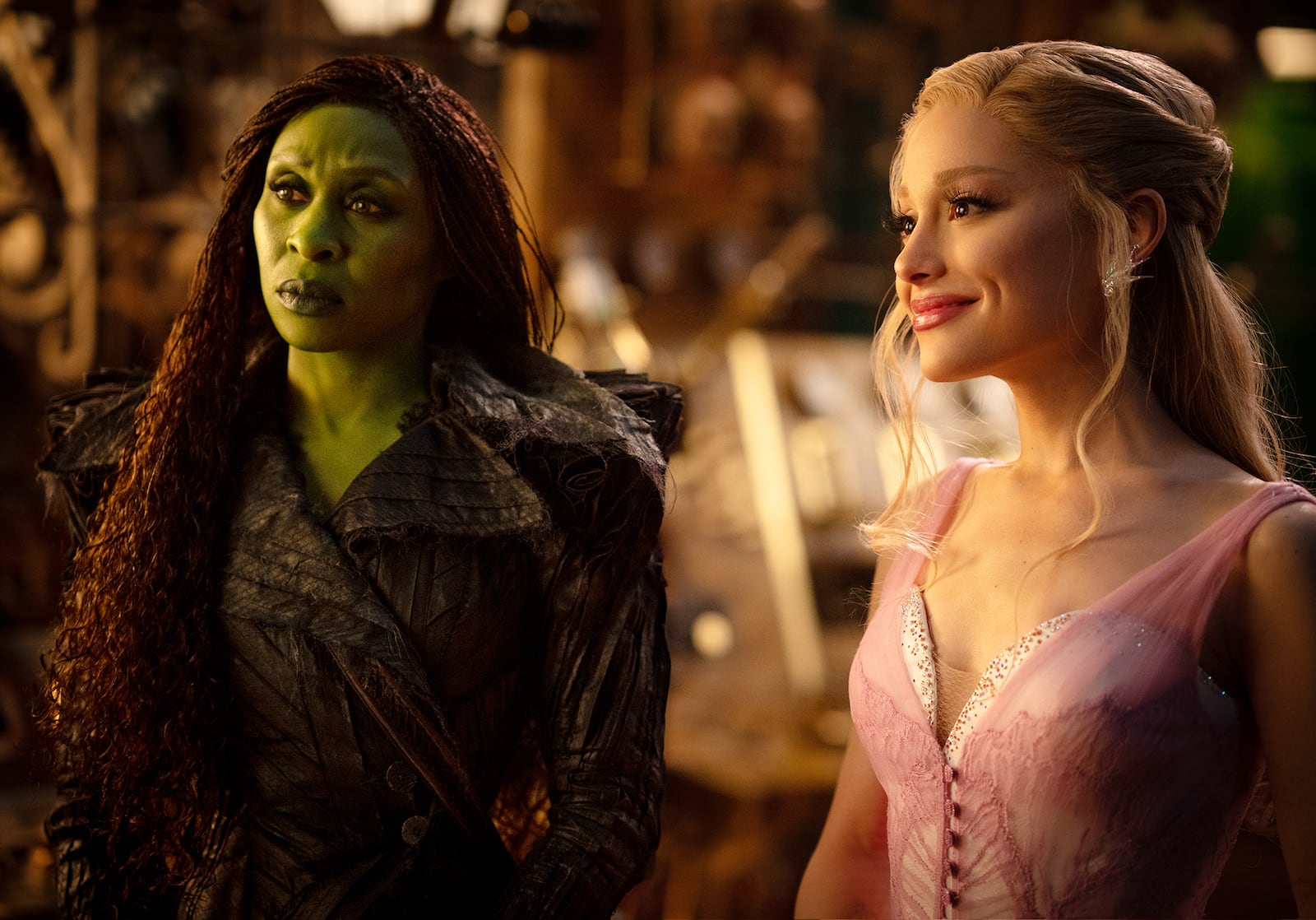 L to R: Cynthia Erivo is Elphaba and Ariana Grande is Glinda in WICKED FOR GOOD.