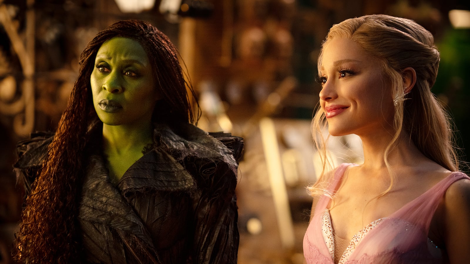 L to R: Cynthia Erivo is Elphaba and Ariana Grande is Glinda in WICKED FOR GOOD.