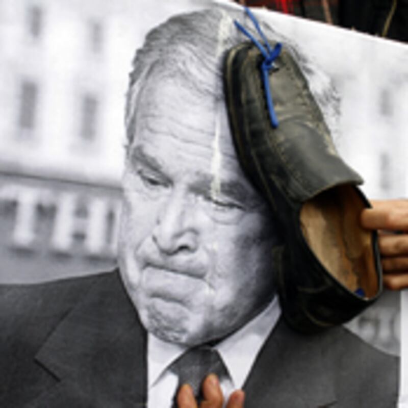 articles/2009/01/27/dear-mr-bush-allah-will-punish-you/elaph-bush-shoe-throwing_11881_thvuf4