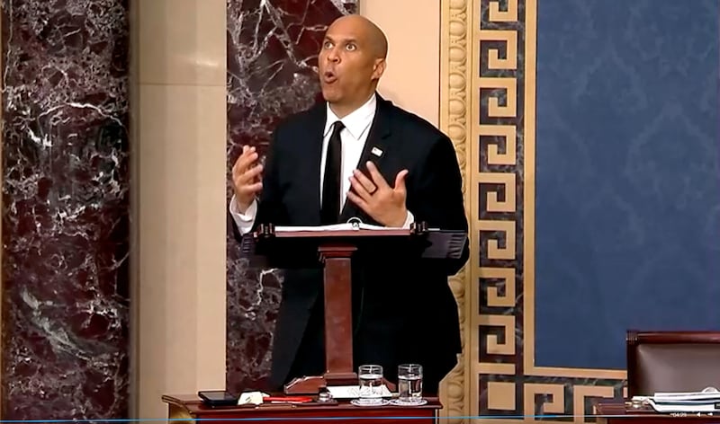 U.S. Senator Cory Booker (D-NJ) delivers a marathon speech protesting the policies of U.S. President Donald Trump, in a frame grab from U.S. Senate video shot in the Senate Chamber at the U.S. Capitol in Washington, D.C., U.S., April 1, 2025. U.S. Senate TV/Handout via REUTERS