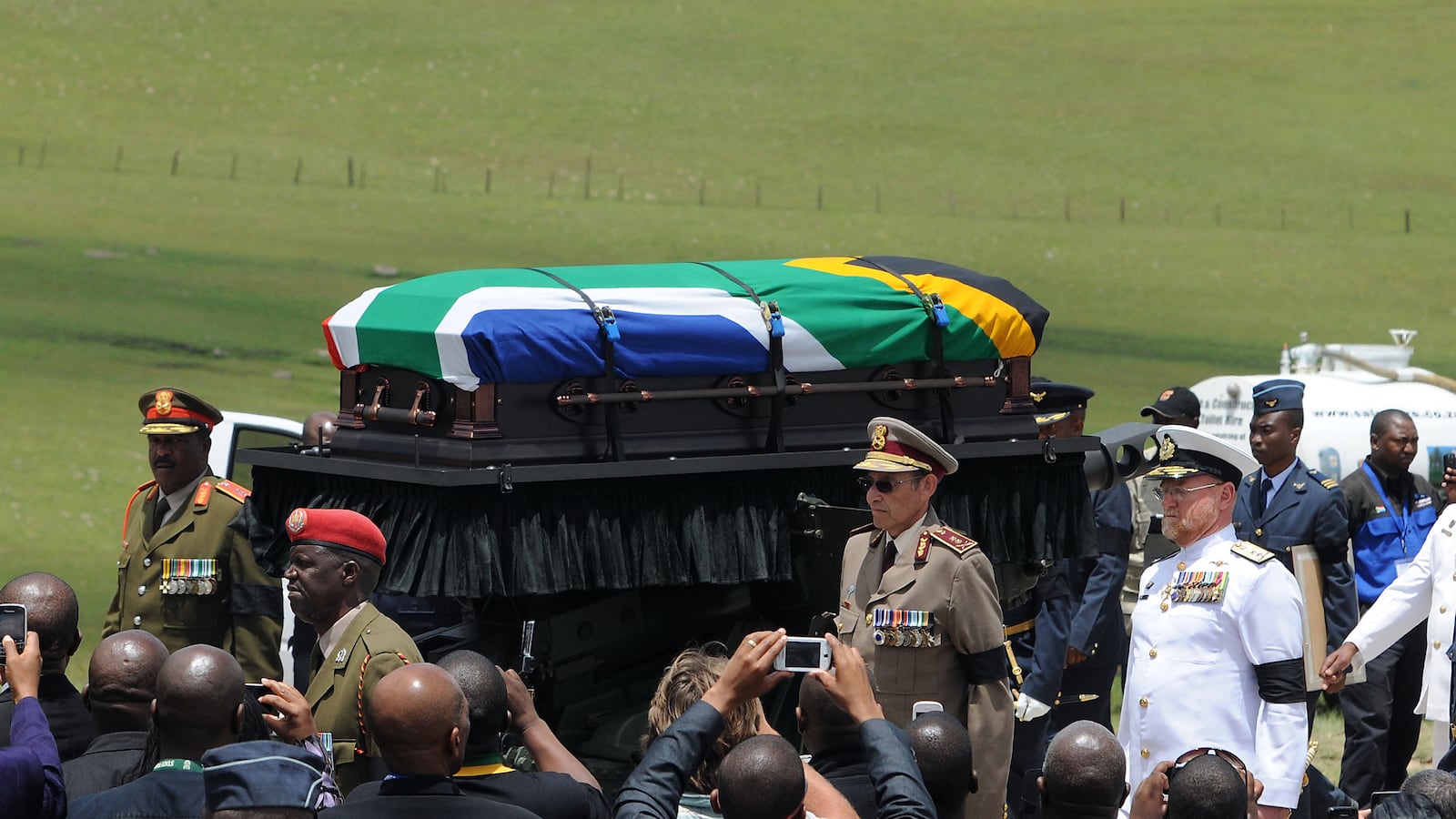 cheats/2013/12/15/nelson-mandela-buried/131215-mandela-funeral-cheat_prcc1v