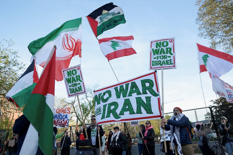 People protest against military action in Iran near the White House in Washington, D.C., U.S., April 8, 2026.