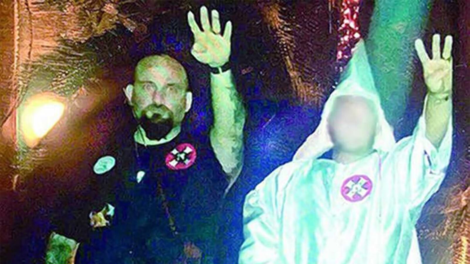 articles/2015/09/05/nazi-saluting-cop-plans-to-sue-for-defamation-of-character/150905-swin-kkk-cop-tease_achacp