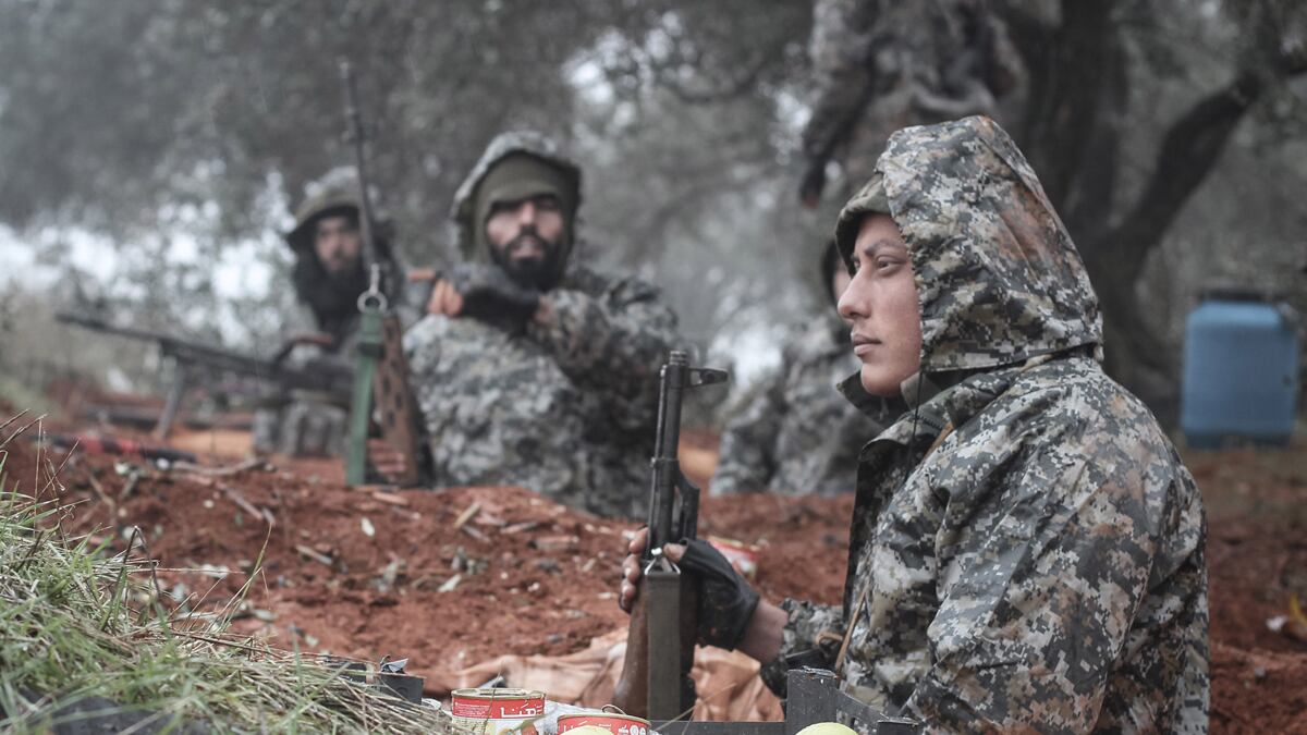 articles/2013/01/31/israel-must-not-get-swallowed-up-by-anarchy-in-syria/syria-rebels-free-iranians-cheat_j2iqpr