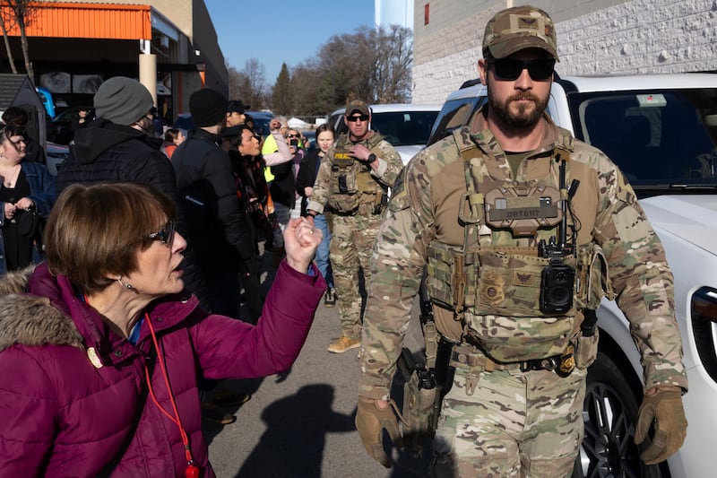 Border Patrol agents are confronted by residents