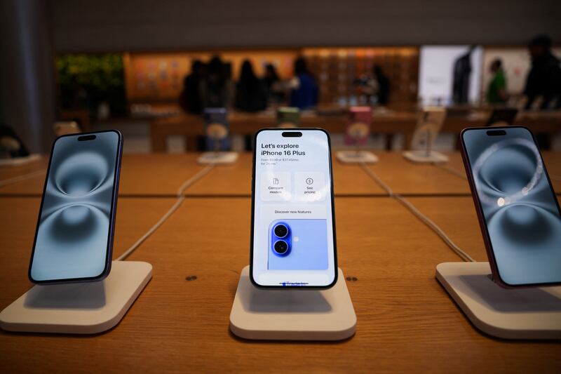 iPhones sit on display at the Apple Fifth Avenue store, in New York City