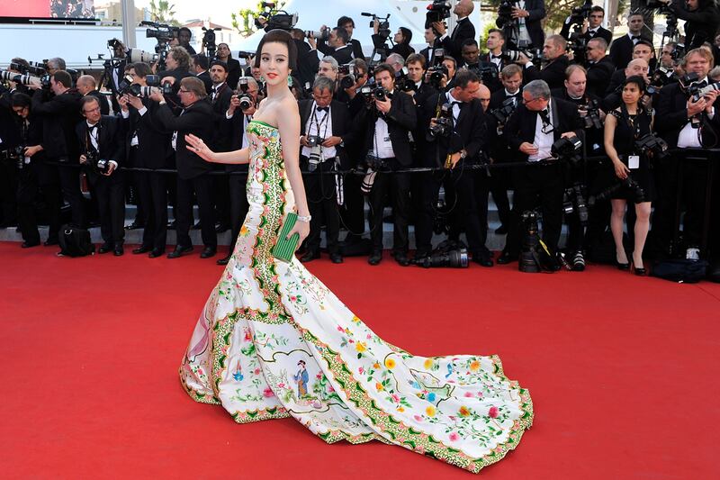 galleries/2012/05/16/tilda-swinton-diane-kruger-alec-baldwin-cannes-film-festival-2012-opening-night-photos/cannes-arrival-fan-bing-bing_spu7do