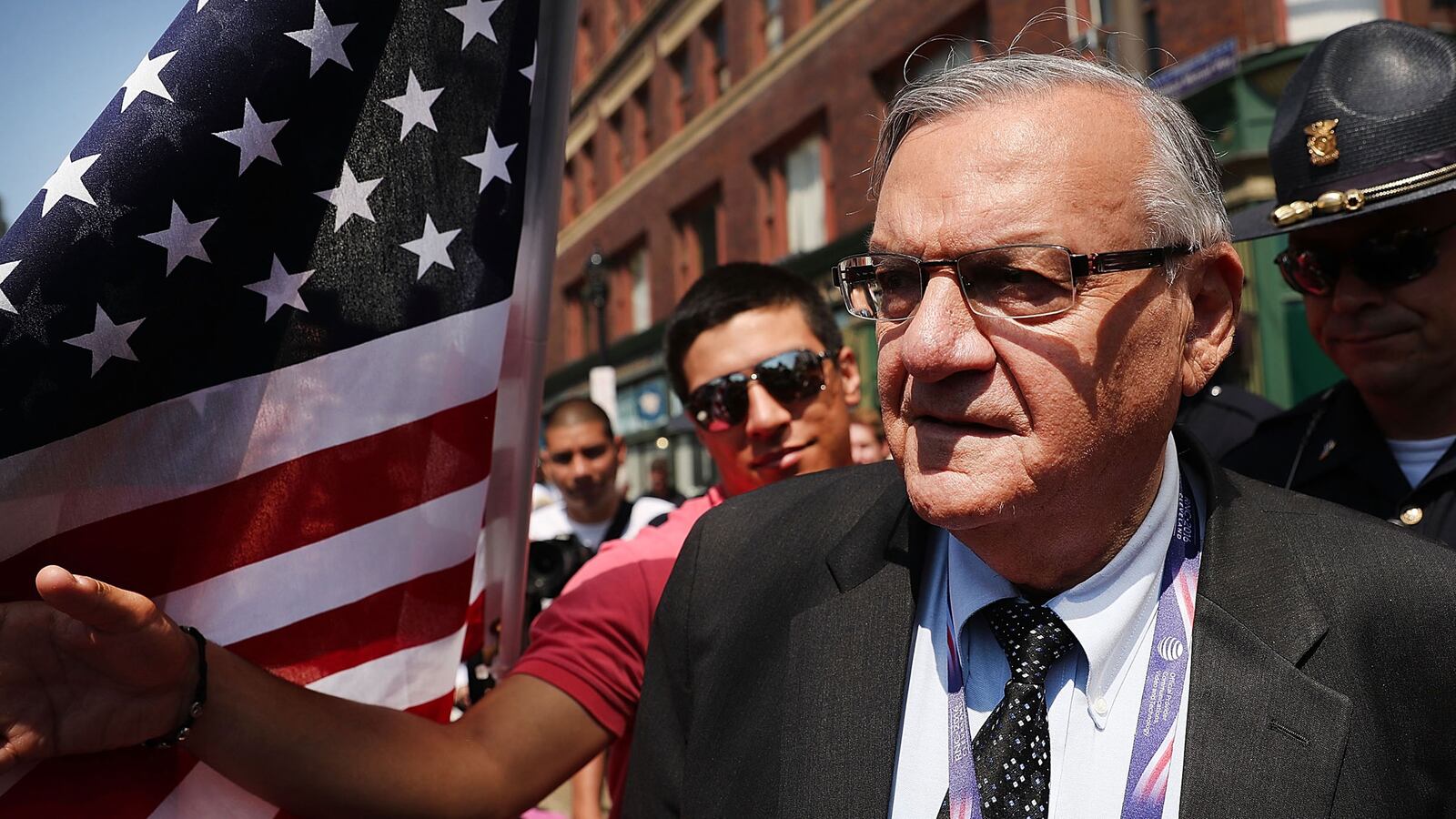 Maricopa County Sheriff Joe Arpaio is surrounded by protesters and members of the media at the the site of the Republican National Convention (RNC) in downtown Cleveland on the second day of the convention.