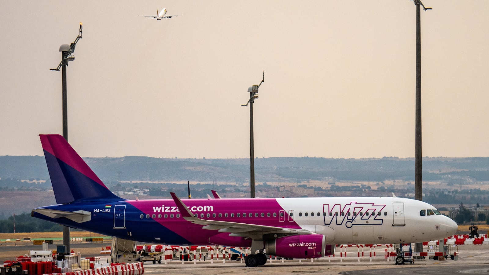 A photo of a Wizz Air place at a Spanish airport.