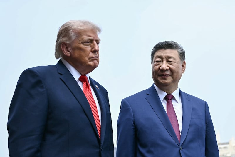 China's President Xi Jinping and President Donald Trump visit the Temple of Heaven in Beijing on May 14, 2026.