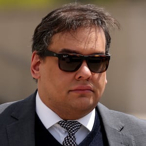 George Santos, who was expelled from the U.S. House of Representatives, departs after the sentencing in his criminal corruption charges at Central Islip Federal Courthouse in Central Islip, New York, U.S., April 25, 2025. REUTERS/Shannon Stapleton