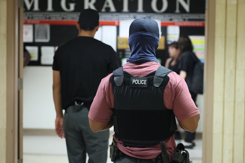 NEW YORK, NEW YORK - AUGUST 14: Federal agents patrol the halls of immigration court at the Jacob K. Javitz Federal Building on August 14, 2025 in New York City. A federal judge ordered the Trump administration and Immigration and Customs Enforcement (ICE) to hold fewer people on the 10th floor holding cells in 26 Federal Plaza where detainees have complained of squalid and overcrowded conditions. The judge also gave an order to allow migrants to call to their lawyers and have access to proper medical and hygienic care. The ruling came after a lawsuit was filed by by legal organizations representing a Peruvian immigrant, Sergio Alberto Barco Mercado who was arrested by ICE and held at 26 Federal Plaza last week. (Photo by Michael M. Santiago/Getty Images)