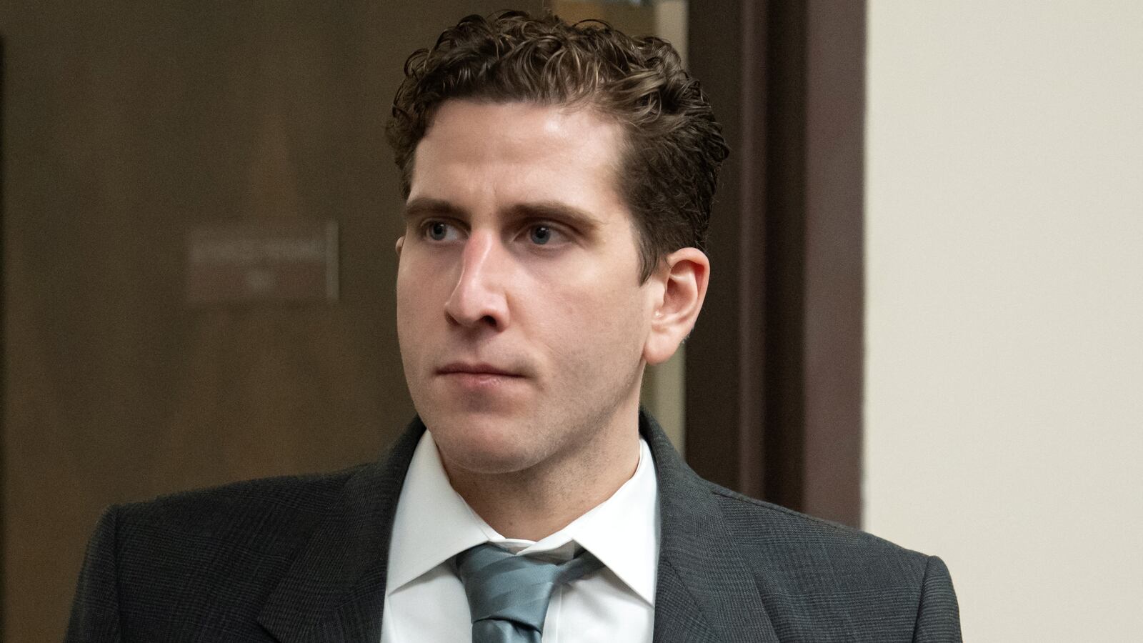 Bryan Kohberger, wearing a suit and tie, appears in court.