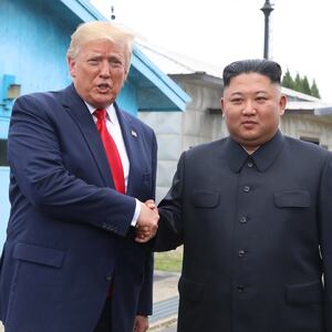 PANMUNJOM, SOUTH KOREA - JUNE 30 (SOUTH KOREA OUT): A handout photo provided by Dong-A Ilbo of North Korean leader Kim Jong Un and U.S. President Donald Trump inside the demilitarized zone (DMZ) separating the South and North Korea on June 30, 2019 in Panmunjom, South Korea. U.S. President Donald Trump and North Korean leader Kim Jong-un briefly met at the Korean demilitarized zone (DMZ) on Sunday, with an intention to revitalize stalled nuclear talks and demonstrate the friendship between both countries. The encounter was the third time Trump and Kim have gotten together in person as both leaders have said they are committed to the "complete denuclearization" of the Korean peninsula. (Handout photo by Dong-A Ilbo via Getty Images/Getty Images)