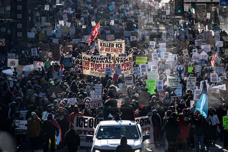 Protesters against ICE marched through the streets of downtown Minneapolis, Minnesota, on Sunday. A new poll shows Trump at his lowest level on immigration since taking office.
