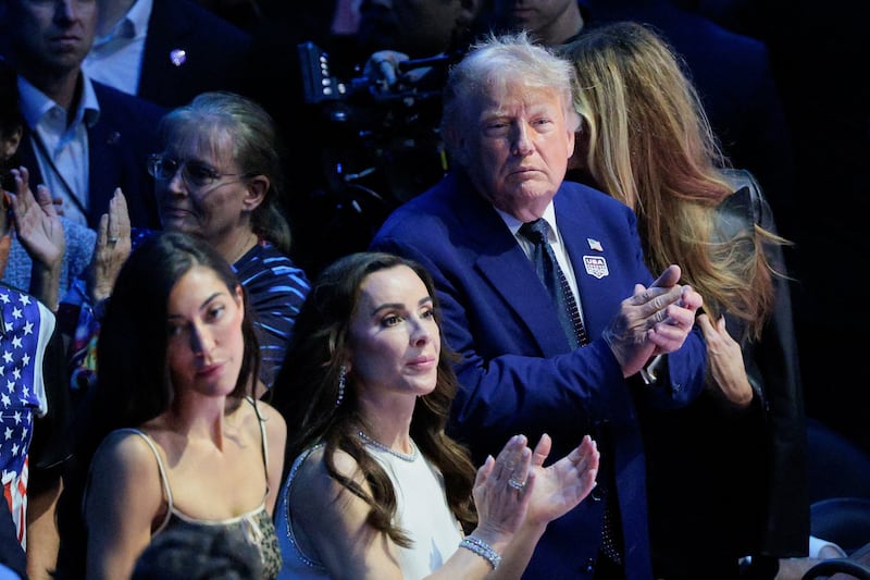 U.S. President Donald Trump applauds during UFC Freedom 250 on the South Lawn of the White House in Washington, D.C., U.S., June 14, 2026. REUTERS/Evan Vucci