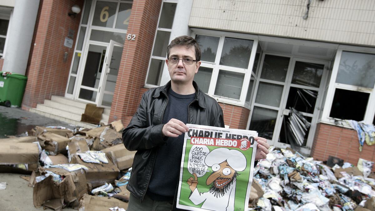 articles/2011/11/02/sarkozy-and-far-right-benefit-from-french-weekly-charlie-hebdo-firebombing/charlie-hedbo-fire-bomobing-dickey_ubjdfw