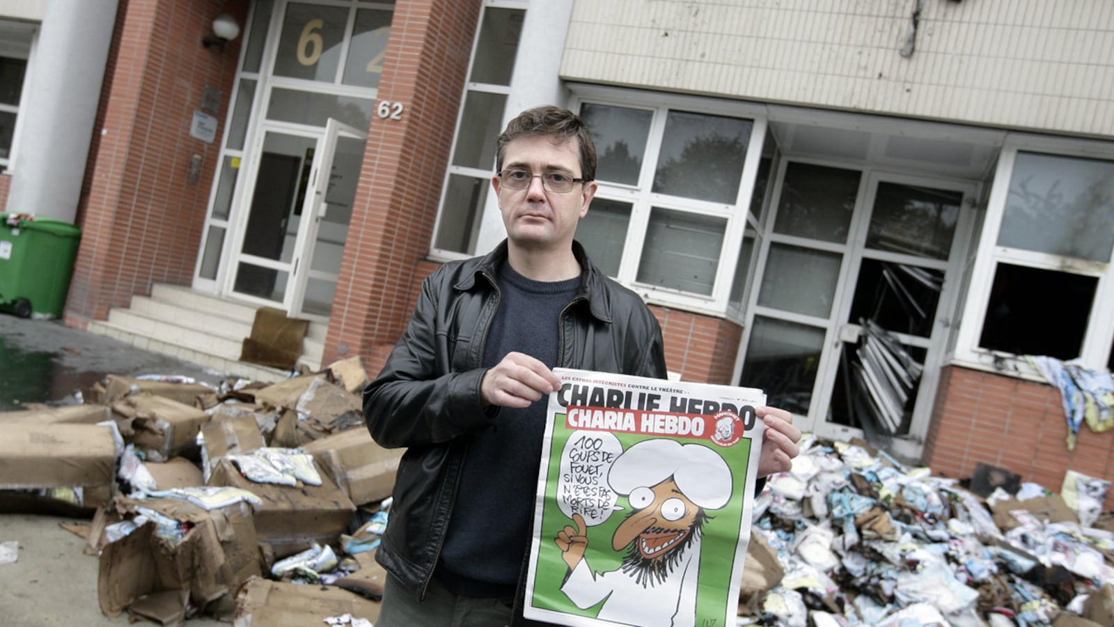 articles/2011/11/02/sarkozy-and-far-right-benefit-from-french-weekly-charlie-hebdo-firebombing/charlie-hedbo-fire-bomobing-dickey_ubjdfw