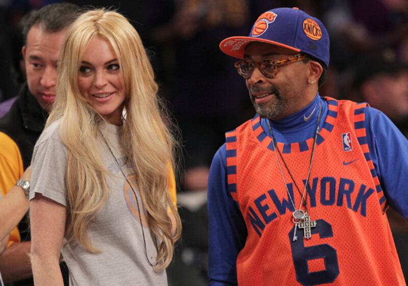 galleries/2011/01/06/unlikely-courtside-matches/unlikely-courtside-matches---lee-and-david_otpuao