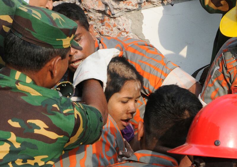 galleries/2013/05/10/woman-rescued-from-rubble-17-days-after-bangladesh-factory-collapse-photos/garment-rescue-4_jce2qw