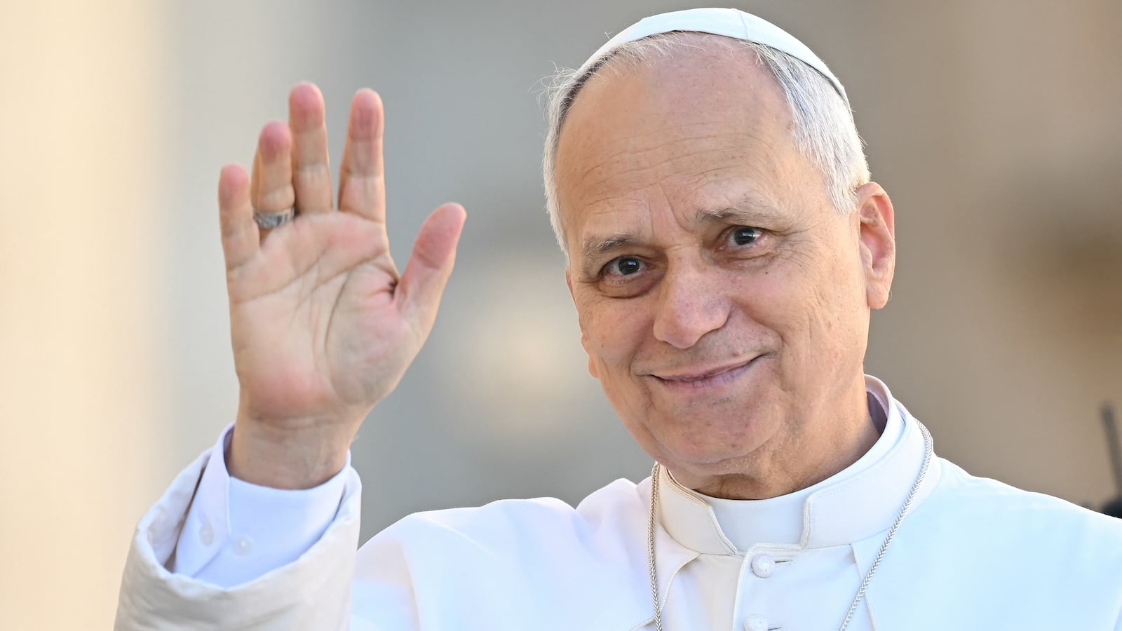 Pope Leo XIV waves to the faithfuls as he arrives to lead the Wednesday General Audience in St. Peter's Square at the Vatican on November 5, 2025. (Photo by Filippo MONTEFORTE / AFP) (Photo by FILIPPO MONTEFORTE/AFP via Getty Images)
