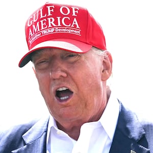 US President Donald Trump, alongside Secretary of Homeland Security Kristi Noem