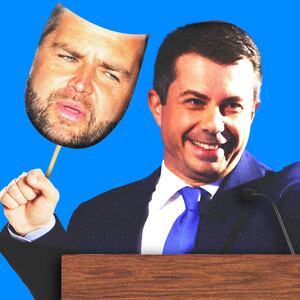 Pete Buttigieg holding a JD Vance mask