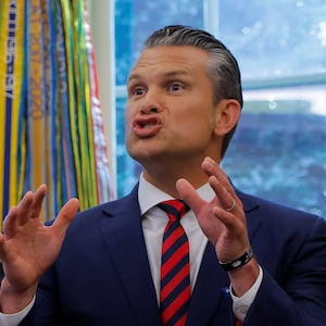 U.S. Defense Secretary Pete Hegseth speaks as U.S. President Donald Trump signs an executive order to rename the Department of Defense the "Department of War", in the Oval Office, at the White House in Washington, D.C., U.S., September 5, 2025. REUTERS/Brian Snyder