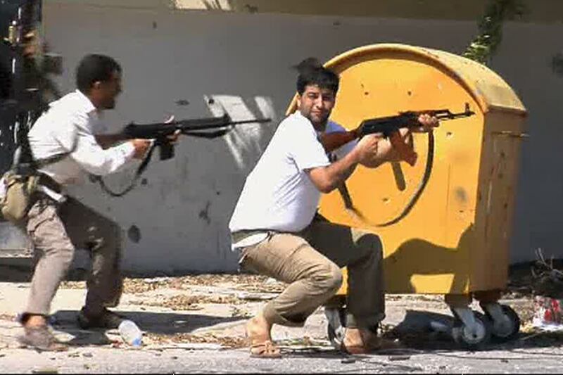 articles/2011/08/22/libya-uprising-gaddafi-s-loyalists-resist-rebel-advances/libya-rebels-babak_gc1tzt