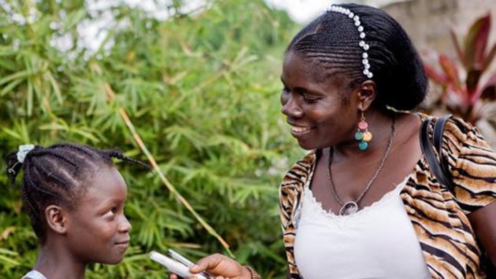 articles/2012/03/23/liberian-writer-mae-azango-forced-into-hiding-for-story-on-female-genital-cutting/mae-azango-liberia-shapiro_y2f0sy