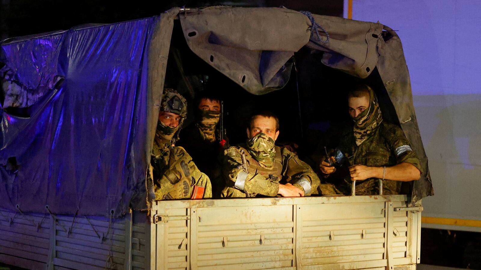 Wagner mercenaries pull out of the headquarters of the Southern Military District to return to base, in the city of Rostov-on-Don, Russia, June 24, 2023.