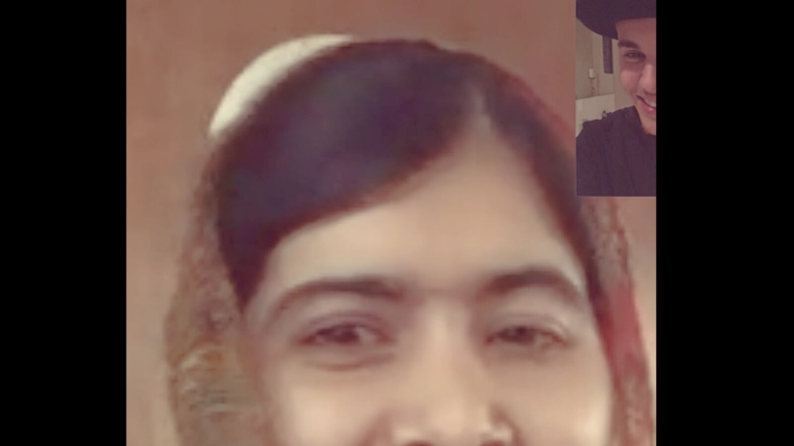 cheats/2014/08/07/bieber-facetimes-with-malala/140807-bieber-malala-cheat_asyzhs