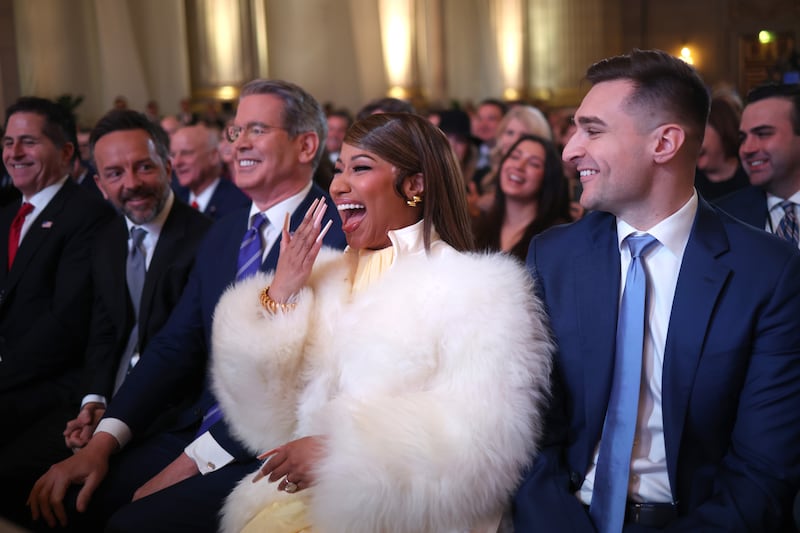 WASHINGTON, DC - JANUARY 28: Musician Nicki Minaj reacts as U.S. President Donald Trump delivers remarks during the Treasury Department's Trump Accounts Summit at Andrew W. Mellon Auditorium on January 28, 2026 in Washington, DC. "Trump Accounts" are a portion of recently passed tax and spending legislation where the federal government will deposit $1,000 into investment accounts for every child born between 2025 and 2028 once parents sign their children up while filing their income taxes.  (Photo by Win McNamee/Getty Images)