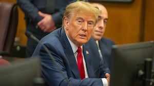 Donald Trump attends a pre-trial hearing at Manhattan Criminal Court.