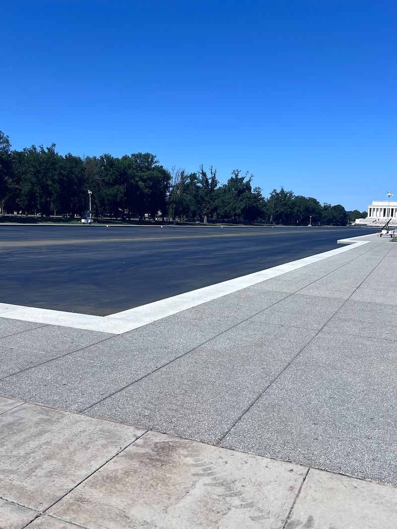 Repairs continue on the reflecting pool.