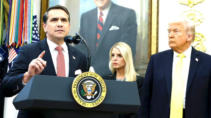 U.S. Deputy Attorney General Todd Blanche (L) speaks as U.S. Attorney General Pam Bondi (C) and U.S. President Donald Trump look on during a press conference