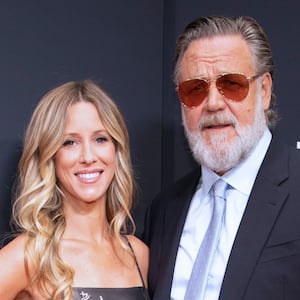 Britney Theriot and Russell Crowe attend the premiere of "Nuremberg".