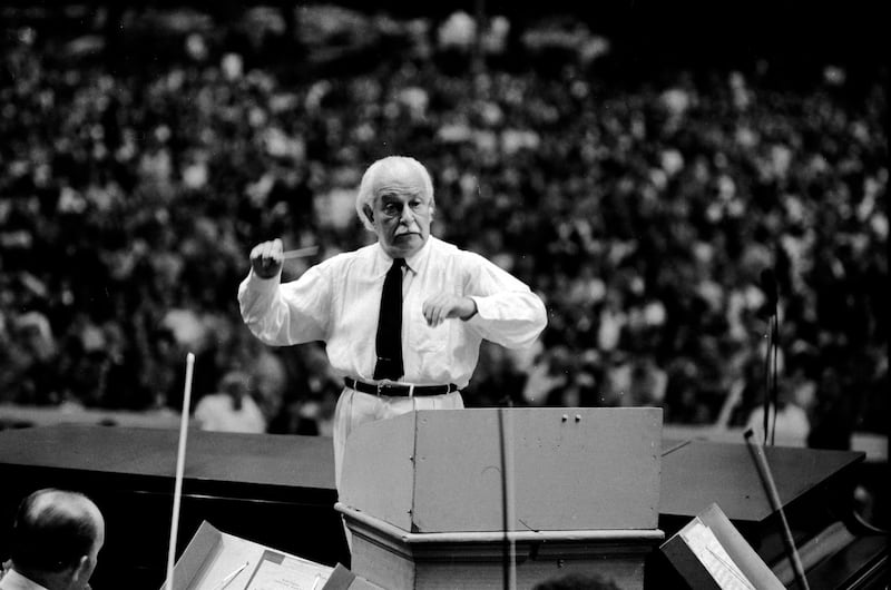 Arthur Fiedler conducts the Boston Pops at the Hatch Shell, Boston, Massachusetts, 1972.