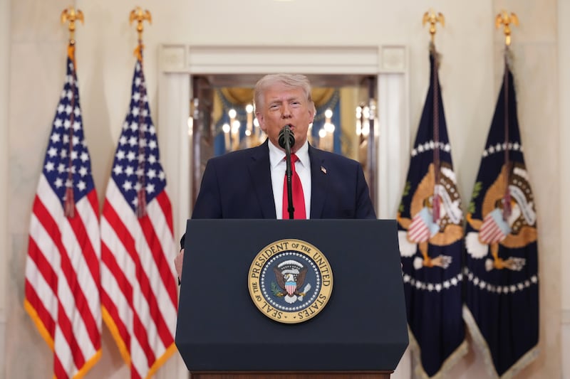 President Donald Trump speaks from the Cross Hall of the White House