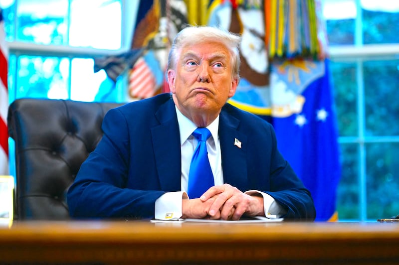 President Donald Trump speaks before signing executive orders in the Oval Office at the White House in Washington, DC, on September 19, 2025.